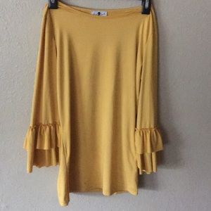 Yellow ruffled shirt